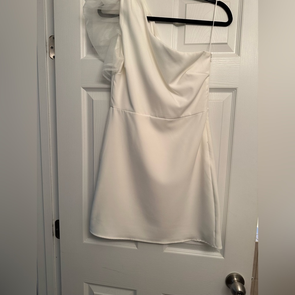 A mini one shoulder dress. Perfect for a bachelorette party!